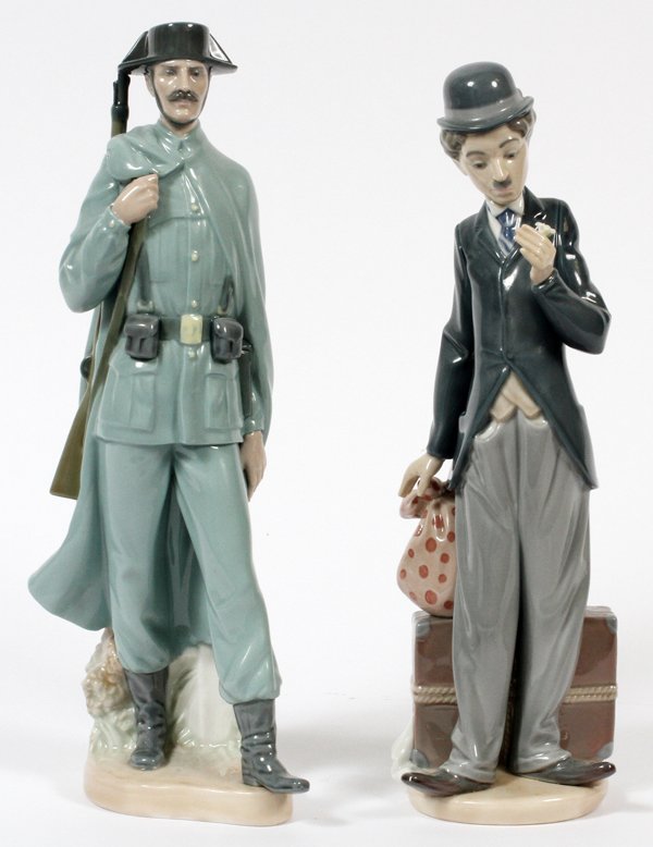 LLADRO FIGURES SPANISH POLICEMAN CHARLIE THE TRAMP: LLADRO PORCELAIN FIGURES (2), H 11" & 12", 'SPANISH POLICEMAN' & 'CHARLIE THE TRAMP':Includes figure of Spanish policeman, #4889, measuring H. 12", and a figure of Charlie Chaplin with flower, "Charli