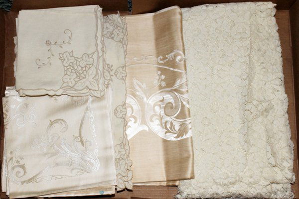 TABLE CLOTH & NAPKINS AND RUNNER 28 PIECES: TABLE CLOTH & NAPKINS AND RUNNER, 28 PIECES:two table cloths, one of lace and having floral designs, 12' x 6'4" and other sculpted design, 68" x 84"; 16 napkins, eight measuring 17" x 16" and eight at