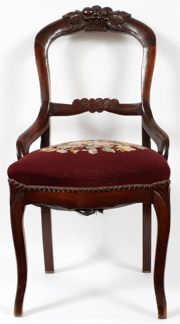 MAHOGANY CARVED SIDE CHAIR: MAHOGANY, CARVED SIDE CHAIR, H 34", W 19":Carved berries and leaf design to frame. Needlepoint seat with burgundy and floral designs, nail head trim.
