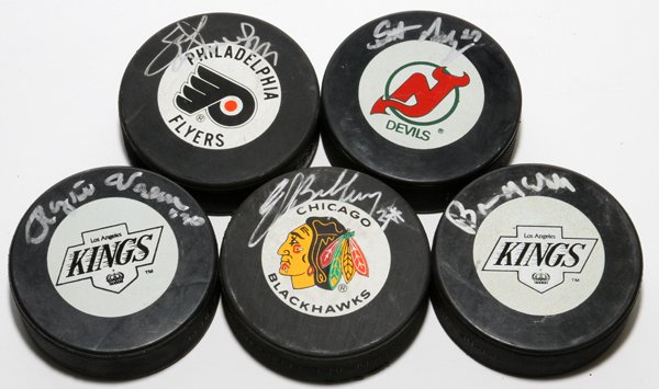 NHL AUTOGRAPHED HOCKEY PUCKS 5 PCS.: NHL AUTOGRAPHED HOCKEY PUCKS, 5 PCS.:includes pucks signed by Ed Balfour, Chicago Black Hawks, Scott Niedermeyer, New Jersey Devils, Eric Lindros Philadelphia Flyers, Rogie Vachon and Bruce McNall (ow