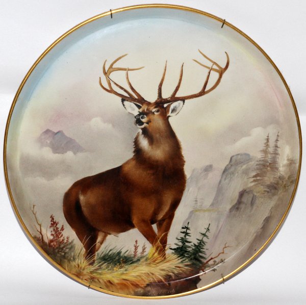 WILLETS-BELLEEK HAND-PAINTED PORCELAIN CHARGER: WILLETS-BELLEEK HAND-PAINTED PORCELAIN CHARGER, DIA 15":Signed, "A. Heidrich" along lower edge. Decorated with stag on a mountain landscape. Double stamped at underside with D'Arcy's mark, #5050/B, an