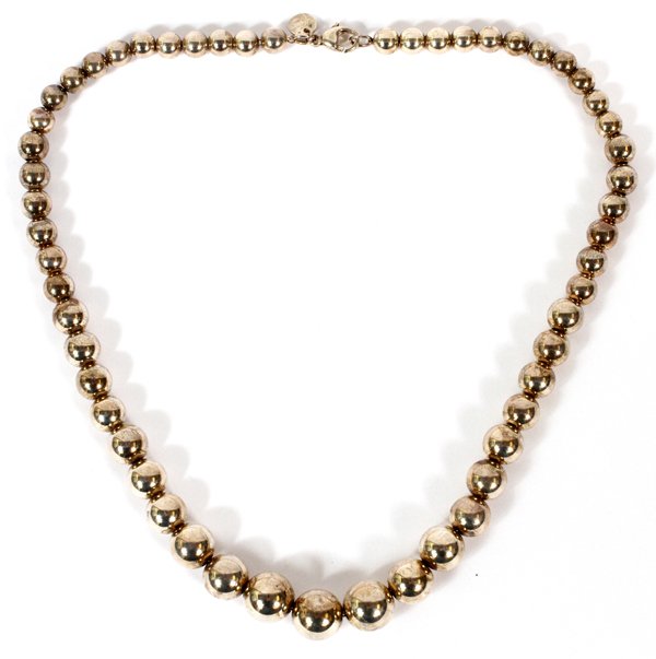 TIFFANY & CO. STERLING BEAD NECKLACE: TIFFANY & CO. STERLING BEAD NECKLACE, L 15":Sterling silver beads of graduated size strung on a thin chain. Stamped "Tiffany & Co. 925". Weighs approximately 0.86 troy oz.