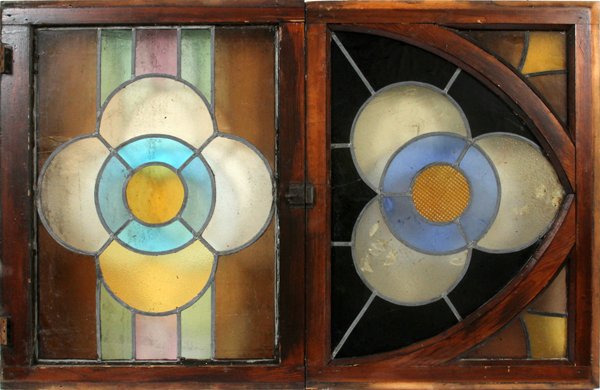 STAIN GLASS WINDOWS 2 PCS. & 25 & 32: STAIN GLASS WINDOWS, 2 PCS. H 32" & 25", W 25" & 32":stain glass windows having an upper and lower frame. A fixed top frame having curved peak form, common to Gothic style windows with circular stain 