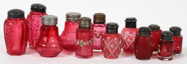 ANTIQUE CRANBERRY GLASS SALT & PEPPER SHAKERS SIX: ANTIQUE CRANBERRY GLASS SALT & PEPPER SHAKERS, SIX PAIRS, H 2 1/4"-3 1/2":Includes two pairs with enameled floral decoration, 1 pair of cut glass shakers, 1 frosted glass pair, 1 lobed form pair with 