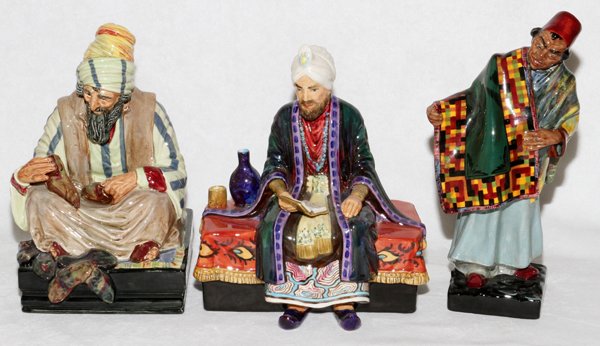 ROYAL DOULTON PORCELAIN FIGURES & ANOTHER: ROYAL DOULTON PORCELAIN FIGURES (2) & ANOTHER BY RAY JOHNSON, H 8 1/2"-9":Royal Doulton includes 1 "The Cobbler, HN 1706, and 1 "Carpet Seller", HN 1464, together with 1 figure of Omar Khayyam by Ray