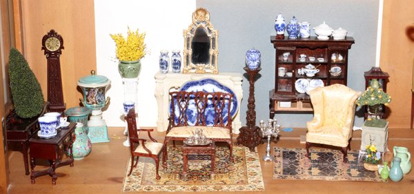 MINIATURE FURNITURE, ACCESSORIES LIVINGROOM SETTING: MINIATURE FURNITURE & ACCESSORIES, 40 PIECES, LIVING ROOM SETTING:Approximately 40 pieces, including a tall case clock, wingback chair, blue and white ceramics, and more.