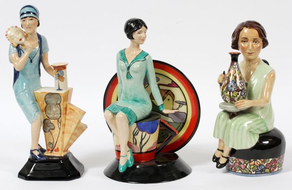 KEVIN FRANCIS STAFFORDSHIRE PORCELAIN FIGURES: KEVIN FRANCIS, STAFFORDSHIRE PORCELAIN FIGURES (3), H 9 1/2"-10 1/2", CLARICE CLIFF & CHARLOTTE RHEAD:Limited edition porcelain figures include 1 "Young Clarice Cliff" depicted seated, number 493/900,