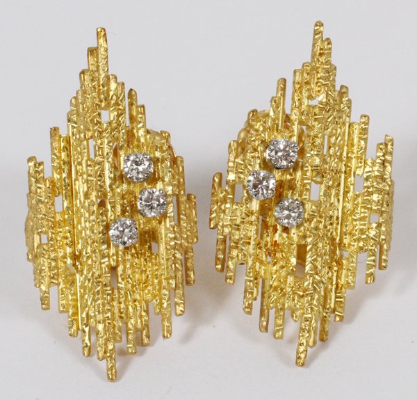 ANDREW GRIMA 18KT YELLOW GOLD & DIAMOND EAR CLIPS: ANDREW GRIMA OF LONDON 18KT YELLOW GOLD & DIAMOND EAR CLIPS, PAIR, L 1 1/4":Three full cut diamonds in each. Stamped: Grima. Totaling approximately 11 grams, From the Estate of Anne Harnett, Grosse Po