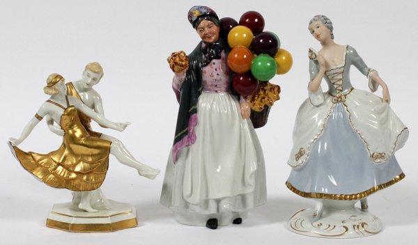 ROYAL DUX ROYAL DOULTON & SITZENDORF FIGURES-3: ROYAL DUX, ROYAL DOULTON AND SITZENDORF PORCELAIN FIGURES, THREE H 5" - 8":The Sitzendorf courting couple has extensive gold trim, accompanied by a Royal Dux standing female with a fan and the Royal D