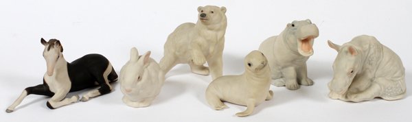 CYBIS PORCELAIN ANIMALS SIX PIECES: CYBIS PORCELAIN ANIMALS SIX PIECES:Pinto colt 5 1/2", design 670; bunny "MR Snowball", 4", design 611; harp seal 4", design 6021; polar bear "Woolie", 5 1/2", design 6036; hippo "Thank goodness its Fr
