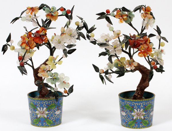 CHINESE CARVED JADE & QUARTZ TREES CLOISONNÉ POTS: CHINESE CARVED JADE AND QUARTZ TREES CLOISONNÉ POTS, PAIR, H 13":A pair of carved hard stone trees including jade leaves, flowering blossoms of quartz and carnelian, planted in cloisonné planters. M