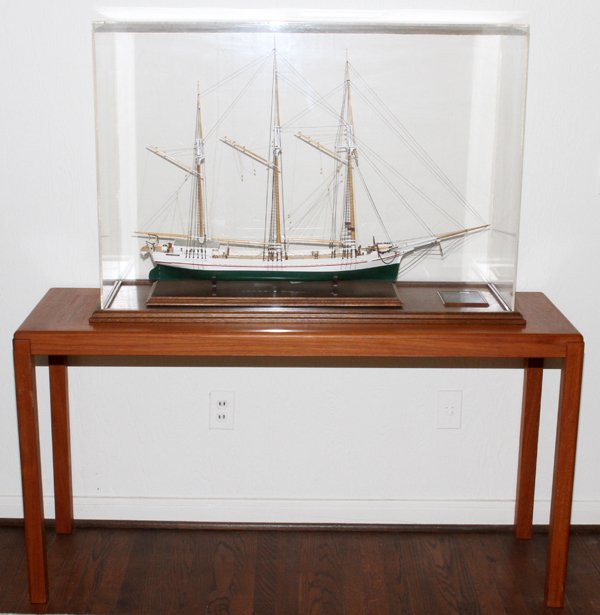 3-MASTED SCHOONER MODEL: 3-MASTED SCHOONER MODEL, H 25", W 6", L 36", WITH TABLE:"Lucia A. Simpson" schooner built in 1875 and in service until 1920. Ship size: H 25", L 36", W 6". Clear glass, H 28", L 42", D 14". Table, H 2