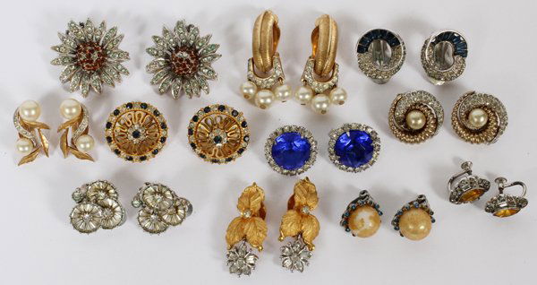 BOUCHER PENNINO JOMAZ & OTHER COSTUME EARCLIPS-11: BOUCHER, PENNINO, JOMAZ, TRIFARI & OTHER COSTUME EARCLIPS, ELEVEN PAIRS:Signed pairs of earclips include 1 Boucher, 3 Pennino, 1 Jomaz, 1 Trifari, together with 5 unmarked pairs.