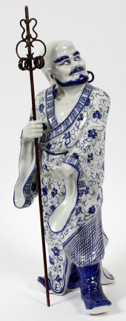 PORCELAIN ORIENTAL FIGURE OF A PRIEST/LOHAN: PORCELAIN ORIENTAL FIGURE OF A PRIEST/LOHAN, H 18":Blue & White. Robed man holding spear.