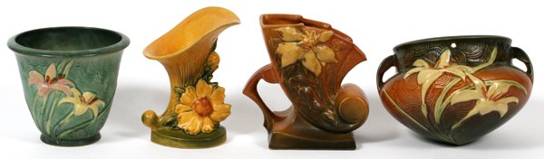 ROSEVILLE POTTERY VESSELS FOUR: ROSEVILLE POTTERY VESSELS, FOUR, H 5 1/2"-6 1/2":Including one "Peony" cornucopia, #170-6, H. 6 1/2" x 4 1/2", one "Clematis" pillow vase, #193-6, H. 6 1/4" x 5", one "Zephyr Lily" flower pot, #672-5,