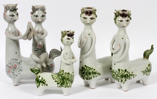 BJORN WIINBLADDANISH POTTERY FIGURAL CANDLESTICKS: BJORN WIINBLAD (1918-2006), DANISH POTTERY FIGURAL CANDLESTICKS, FOUR, H 9"-11 1/2":Each is in the form of a centaur, one of which with a female rider. Glazed in gray in green. All are marked at under