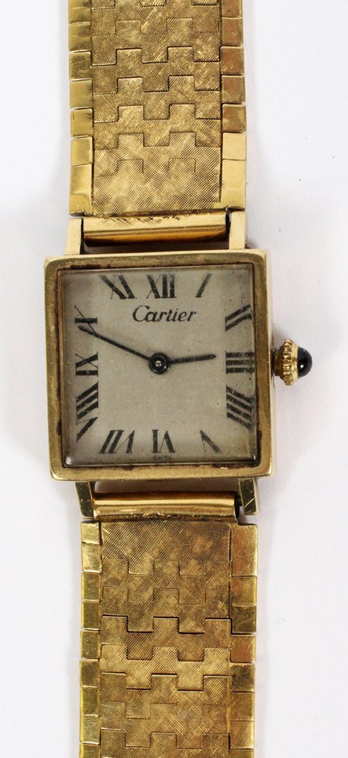 CONCORD WATCH CO. 14KT GOLD WRISTWATCH FOR CARTIER: CONCORD WATCH CO. 14KT YELLOW GOLD WRISTWATCH FOR CARTIER WITH 18KT BAND, L 7":A square 14kt yellow gold case with black Roman numerals and sapphire crown, the interior of the back stamped "Concord Wa