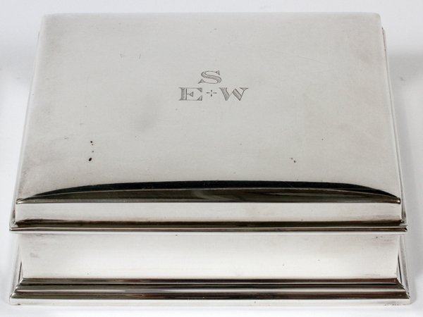 GORHAM STERLING CIGARETTE BOX: GORHAM STERLING CIGARETTE BOX, H 1 3/4", W 5":A rectangular sterling silver box with monogrammed hinged cover opening to divided wood lining; stamped underneath (see additional photo). Measures H.1 3/