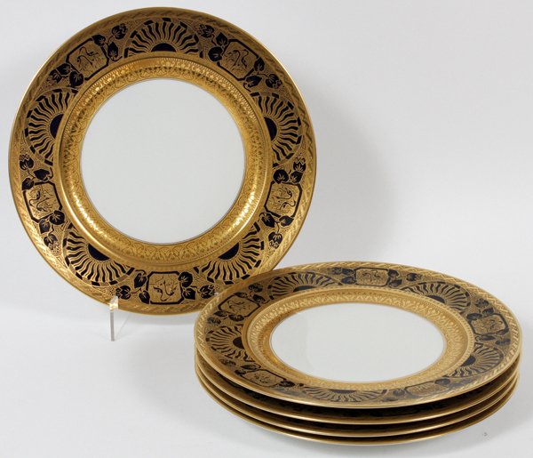 HEINRICH & CO. PORCELAIN DINNER SERVICE PLATES -5: HEINRICH & CO. PORCELAIN DINNER SERVICE PLATES, DIA 11", SET OF FIVE:Bird, floral and sun design. Black with gold trim.
