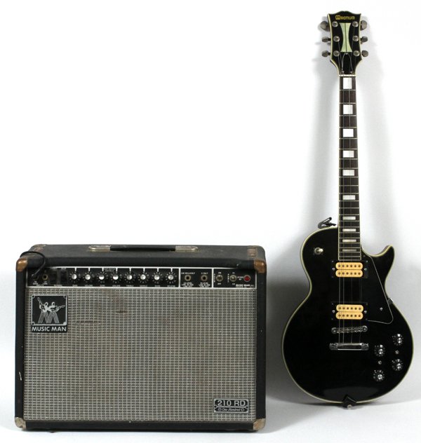 TUBE AMPLIFIER W/ A ELECTRIC MAGNUM GUITAR: MUSIC MAN, TUBE AMPLIFIER WITH A SOLID BODY ELECTRIC MAGNUM GUITAR:The amplifier model # is 210-RD-100, the chassis # is 2100 RD and the serial # is DP 06604. The height is 15", width 22" and the dept
