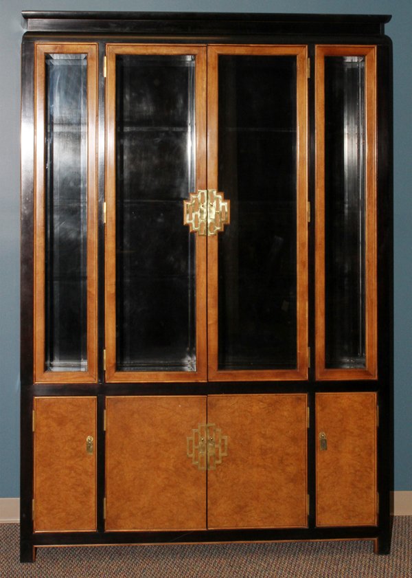 CENTURY FURNITURE CO. WOOD CHINA CABINET: CENTURY FURNITURE CO. BURL & EBONIZED WOOD CHINA CABINET, H 81", W 58", D 16":A pair of beveled glass doors above four cabinet doors.