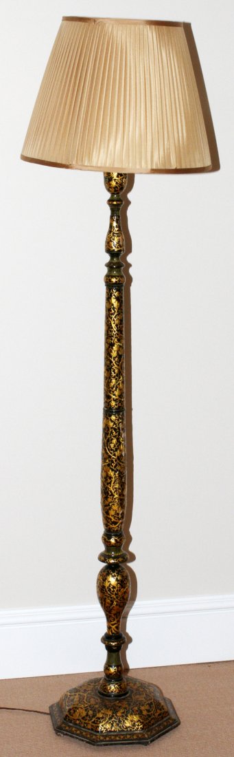 PAPIER MACHE FLOOR LAMP: PAPIER MACHE FLOOR LAMP, H 71":Decorated with all over leaf on branch motif with bird figures in gold, measuring H. 71" overall. Property from the Estate of Marjorie J. Rose.