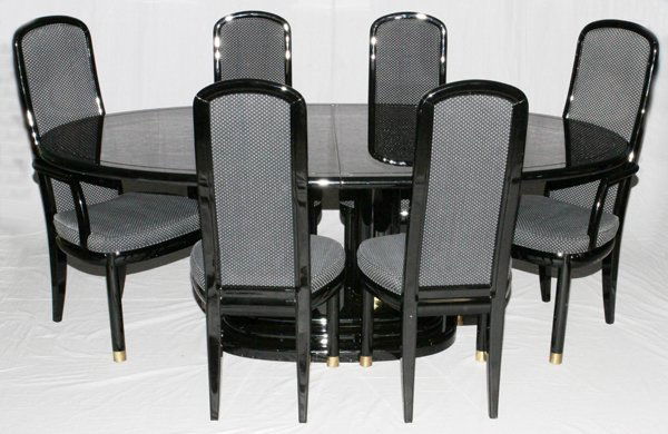 HENREDON SCENE THREE DINING SUITE TEN PIECES: HENREDON "SCENE THREE" DINING SUITE, TEN PIECES:Including an oval black lacquer pedestal dining table, with central burl insert L 80", D 56" , accompanied by one leaf D 20", six side chairs and two ar