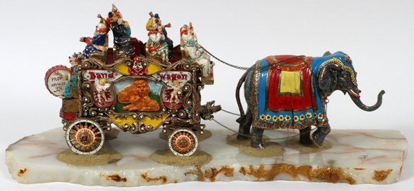 RON LEEBAND WAGON SCULPTURE 1984: RON LEE [AMERICAN, B. 1947], "BAND WAGON" SCULPTURE, 1984, H 11" L 30":Signed and dated at the alabaster base. Measuring 11" x 30".