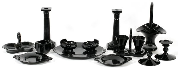 CAMBRIDGE 'EBONY' GLASS TABLEWARE EARLY 20TH C.: CAMBRIDGE, 'EBONY', GLASS TABLEWARE, EARLY 20TH C., 15 PCS:Including a Decagon creamer and sugar set, fitted with a handled tray; together with 2 pairs of candlesticks, measuring H. 4" and H. 9 1/2", 
