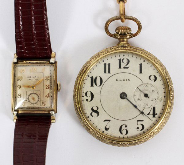 ELGIN AND GRUEN WATCHES TWO: ELGIN AND GRUEN WATCHES, TWO:Elgin pocket watch on chain, gold filled, c 1900, no monogram. Also wrist watch by Gruen "Veri-thin" #0268154 with base metal back and Speidel band.