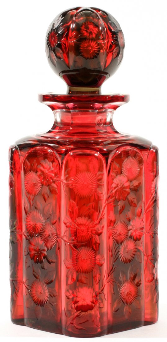 STEVENS & WILLIAMS INTAGLIO CUT GLASS DECANTER: STEVENS & WILLIAMS INTAGLIO CUT TWO-COLOR GLASS DECANTER, C. 1910, H 9":Intaglio cut ruby colored glass with sage green colored panels about the body and stopper (visible in the photograph only at the
