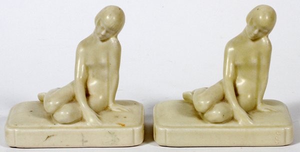 LOUISE ABEL ROOKWOOD POTTERY PAPERWEIGHTS 1929 PAIR: LOUISE ABEL, ROOKWOOD POTTERY PAPERWEIGHTS, 1929, PAIR, H 4":Reclining female nude form paperweights by Louise Abel, ivory mat glaze. Impress marked at the underside, #2868, dated XXIX (see second pho