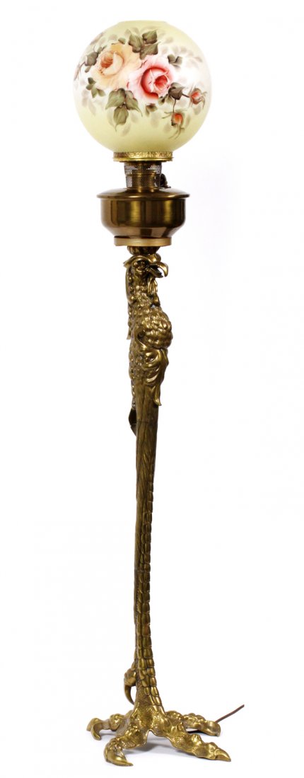 P. E. GUERINBRASS ORGAN LAMP W/ EAGLE BASE C. 1886: P. E. GUERIN (1833-1911), BRASS ORGAN LAMP WITH EAGLE BASE, C. 1886, WITH PAINTED GLOBE:The brass oil lamp base is in the form of an eagle-like bird ending in a single claw base, marked underneath. Pi