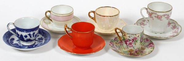 PORCELAIN DEMI TASSE & SAUCERS SIX SETS: PORCELAIN DEMI TASSE & SAUCERS, SIX SETS, H 2"-3":Assorted porcelain demitasse cups and saucers. With a measuring H range 2 1/4 - 3 1/4".