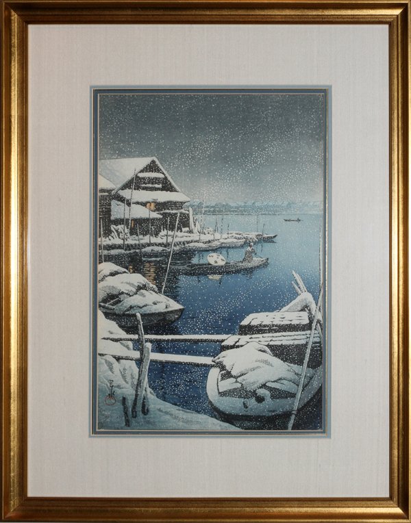 KAWASE HASUI WOODBLOCK PRINT: KAWASE HASUI WOODBLOCK PRINT, H 14.25", L 9.5", "SNOWSTORM AT MUKOJIMA":Kawase Hasui [Japanese, 1883-1957]. Signed lower left. Framed and matted under glass.