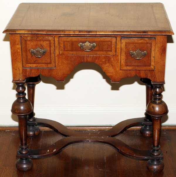 WILLIAM & MARY STYLE WALNUT LOWBOY 18TH C.: WILLIAM & MARY STYLE WALNUT LOWBOY, 18TH C., H 29", W 29", D 18":Fitted with three drawers, raised on trumpet-form supports joined by stretchers.