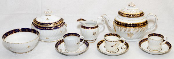 WORCESTER ENGLISH PORCELAIN TEA WARE C. 1800: WORCESTER, ENGLISH PORCELAIN TEA WARE, C. 1800, 29 PIECES:Assembled set in four different patterns, including 1 teapot, H.7", 1 covered sugar bowl (crack to the base), 1 creamer, and 1 waste bowl, Dia