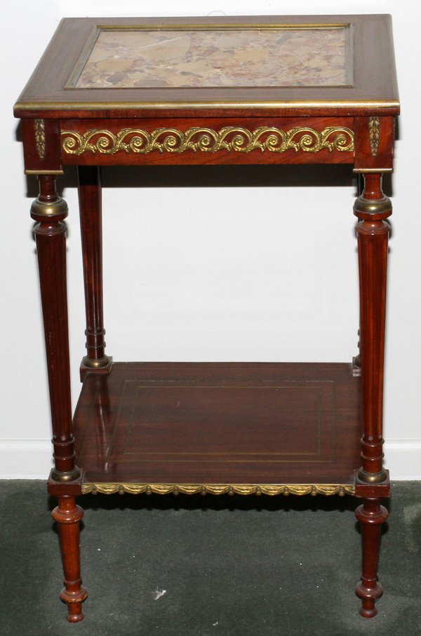 FRENCH MAHOGANY & BRONZE MOUNTED TABLE: FRENCH MAHOGANY & BRONZE MOUNTED TABLE WITH MARBLE TOP, H 32", W 20", D 17":Inset marble top on fluted tapering legs joined by a shelf stretcher. Fitted with a single drawer. Mid 20th century.