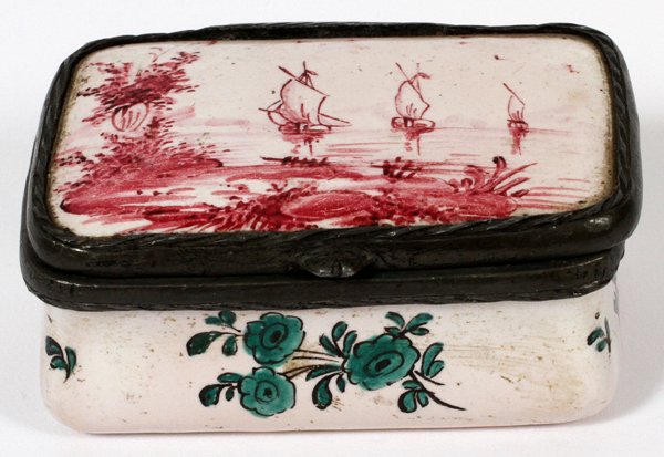 FRENCH FAIENCE TRAVELING INKWELL 18TH C.: FRENCH FAIENCE TRAVELING INKWELL, 18TH C., H 1 1/4", L 2 3/4":Faience box with hinged cover decorated with water scene of boats and trees, a removable metal inkpot, and marked "S.X" in green on the un