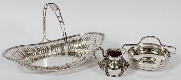 AMERICAN STERLING TABLEWARE EARLY 20TH C. -3PC: AMERICAN STERLING TABLEWARE, EARLY 20TH C., THREE PIECES, L 11":Sterling silver includes 1 Frank M. Whiting bread basket with pierced rim, number 8011, H.6 1/2" x 11 1/2"; 1 Webster Co. round candy ba