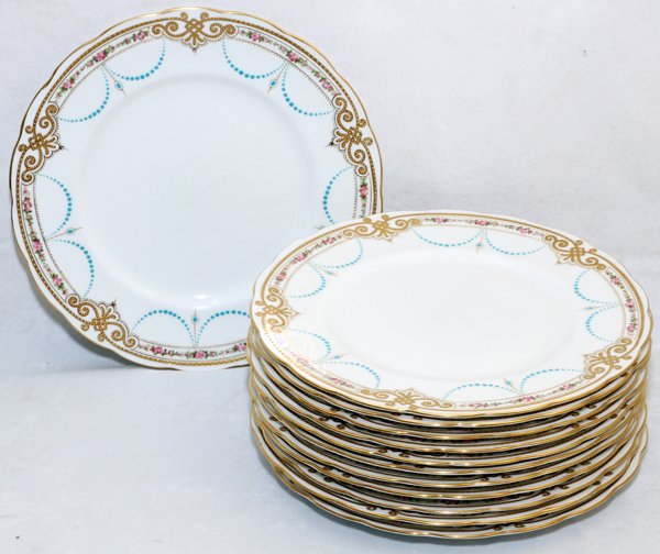 GEORGE JONES & SONS ENGLISH PORCELAIN DINNER PLATES: GEORGE JONES & SONS, ENGLISH PORCELAIN DINNER PLATES, C. 1930, TWELVE, DIA 10 1/2":Pink floral and blue beaded swag motif; stamped on the reverse (see additional photo).
