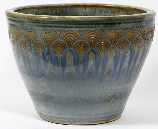 ART POTTERY JARDINIÈRE: ART POTTERY JARDINIÈRE, H 9 3/4", DIA 13 1/4":Glazed in blue and green tones, with incised arched line design about the rim. No apparent markings, measuring H.9 3/4" x 13 1/4".