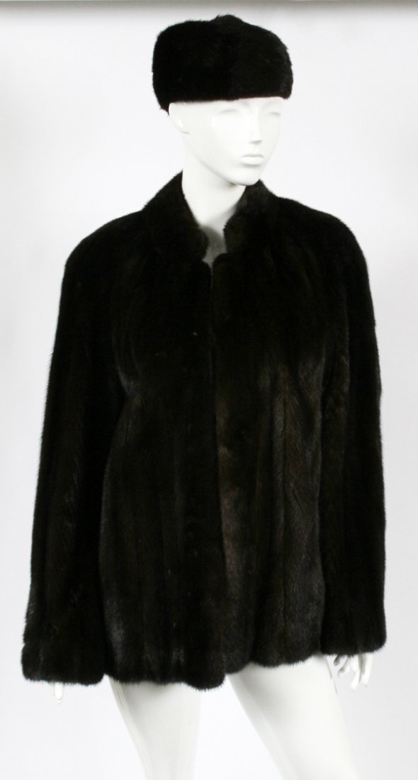 MINK FUR LADIES COAT & HAT C. 1950 TWO: MINK FUR LADIES COAT & HAT, C. 1950, TWO, L 30":Including a half width dark brown mink fur coat, measuring L. 30" approximately, with a shoulder to shoulder width of 19", and a 27 1/2" sleeve length;