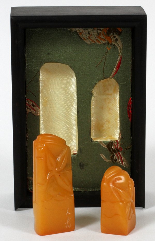 CHINESE HARD STONE SEALS TWO: CHINESE HARD STONE SEALS, TWO, H 1 1/4"; 2 1/4":Amber in color and in a fitted box.