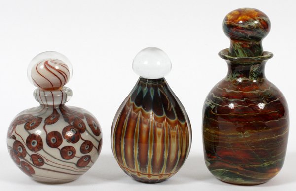 CONTEMPORARY ART GLASS PERFUME BOTTLES 1979-81: CONTEMPORARY ART GLASS PERFUME BOTTLES, 1979-81, 3 PCS:Including one by Art Reed, dated 10/79, at H. 4 1/2", together with one by Paul Trautman, dated 1981, at H. 5 3/4", and one by N. Freeman, dated 