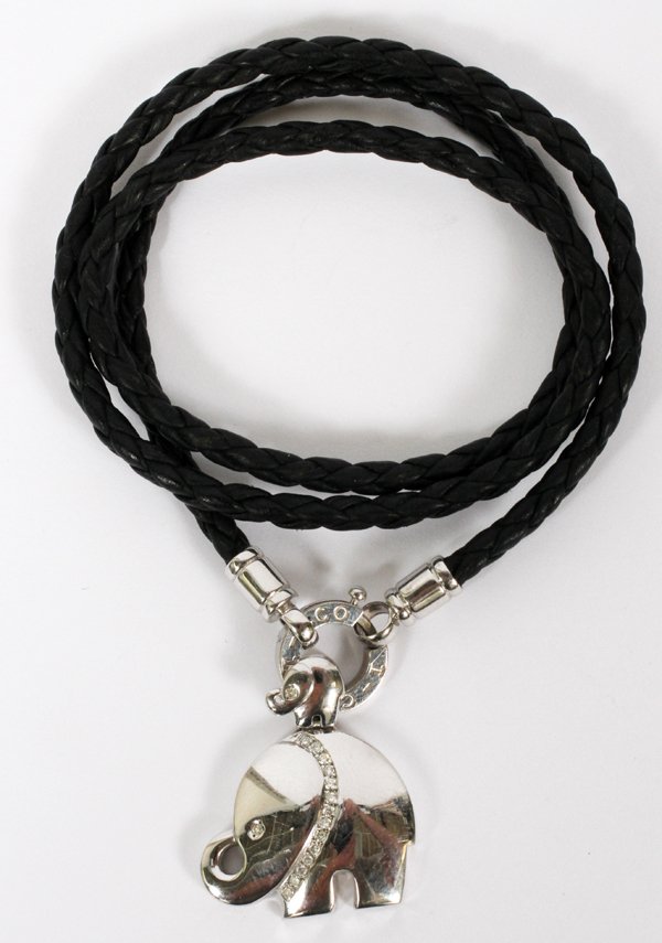 18KT WHITE GOLD & DIAMOND ELEPHANT PENDANT: 18KT WHITE GOLD & DIAMOND ELEPHANT PENDANT, L 1", WITH BRAIDED LEATHER NECKLACE:Stamped "18K" on the reverse.