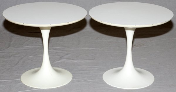 STYLE OF EERO SAARINEN TULIP TABLES MID 20TH C.: STYLE OF EERO SAARINEN TULIP TABLES, MID 20TH C., PAIR, H 15" DIA 18":Each side table has a round white laminate top on a white enameled metal base. No apparent markings. Measuring H. 15" x 18", mid 2