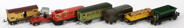 LIONEL 'O' GAUGE PRE-WAR TIN FREIGHT CARS C1926-37: LIONEL 'O' GAUGE PRE-WAR TIN FREIGHT CARS, C1926-37' 7 PCS.:includes: Lionel Lines #1682 red tin caboose, c1933-42; green and black coal dumper car (no number), Lionel Lines dark gray tender (no numbe