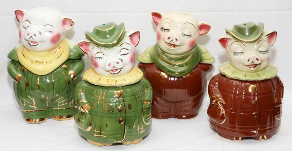 SHAWNEE POTTERY CERAMIC COOKIE JARS/BANKS FOUR: SHAWNEE POTTERY CERAMIC 'SMILEY' & 'WINNIE' COOKIE JARS/BANKS, FOUR, H 10":Including 2 limited edition reissues in green and yellow, each is signed, numbered and dated 1994 (see additional photo) and
