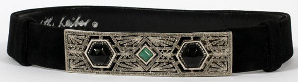 JUDITH LEIBER BLACK SUEDE BELT W/ BUCKLE: JUDITH LEIBER BLACK SUEDE BELT WITH AN ART DECO STYLE BUCKLE:A black suede adjustable belt with a marcasite buckle in the art deco style and set with three cabochon stones of black and green, W.4 1/2"